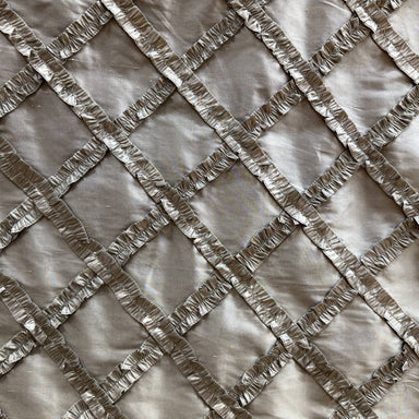 Adelle Fabric in color Bronze is a Diamond Geometric Silk Fabric that is good for Drapery & Curtain Fabric
