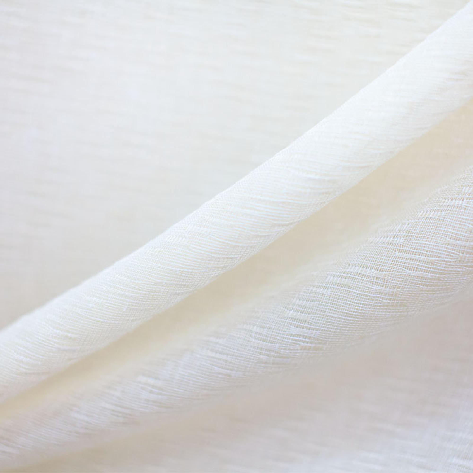 Anthony fabric in color Ivory showcasing fabric solid textured sheer drapery & curtain fabric.
