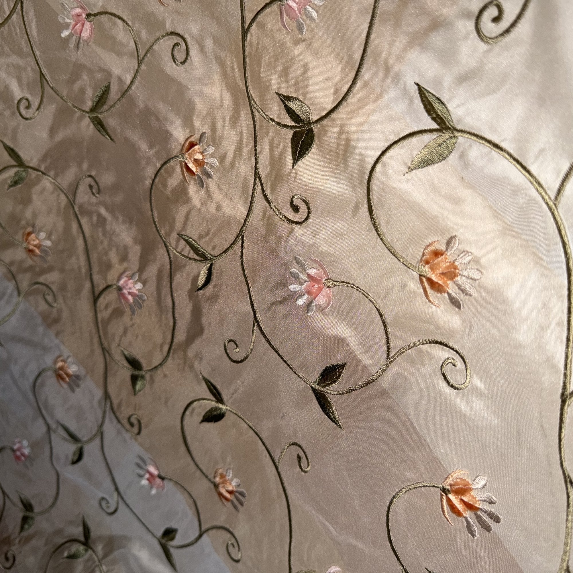Caroline Fabric in color Apricot is an Embroidered Floral Silk Fabric that is good for Drapery & Curtain Fabric