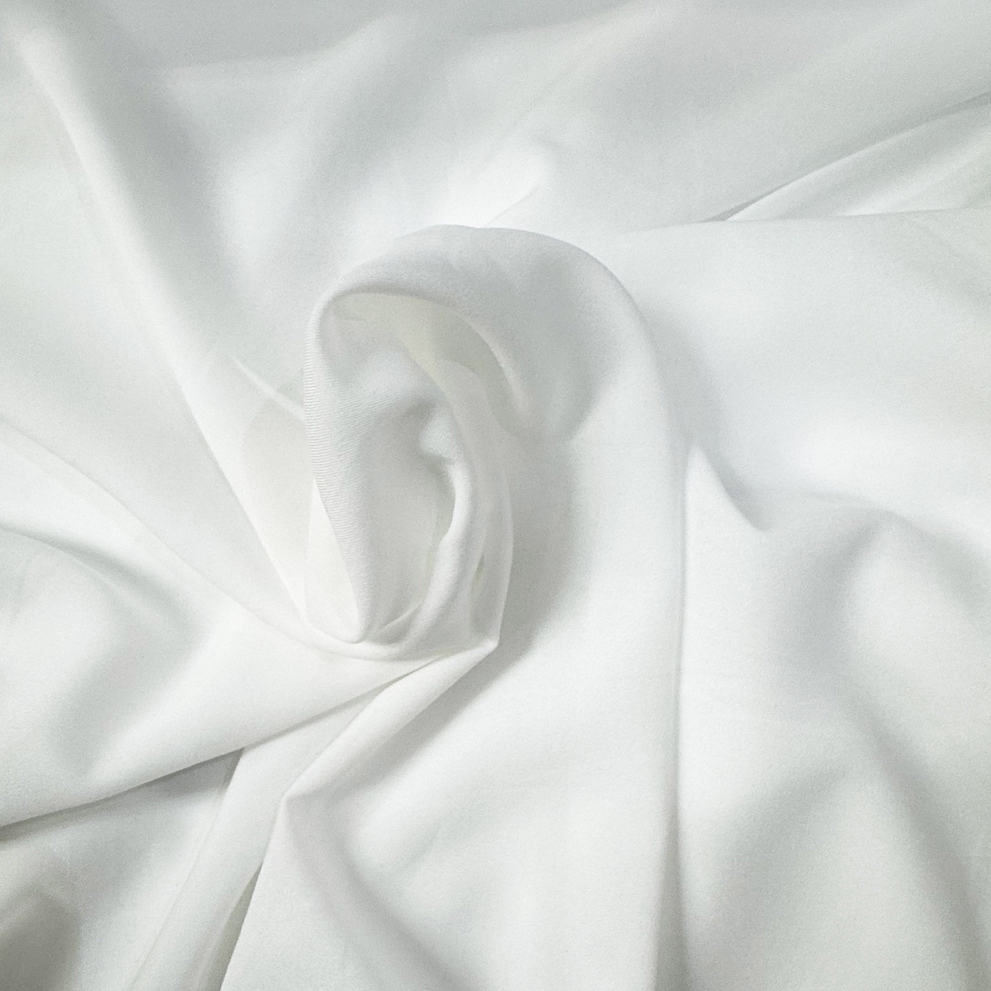 Coltan Fabric in color Ivory is a Solid Sheer Fabric that is good for Drapery & Curtain Fabric
