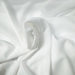 Coltan Fabric in color Ivory is a Solid Sheer Fabric that is good for Drapery & Curtain Fabric