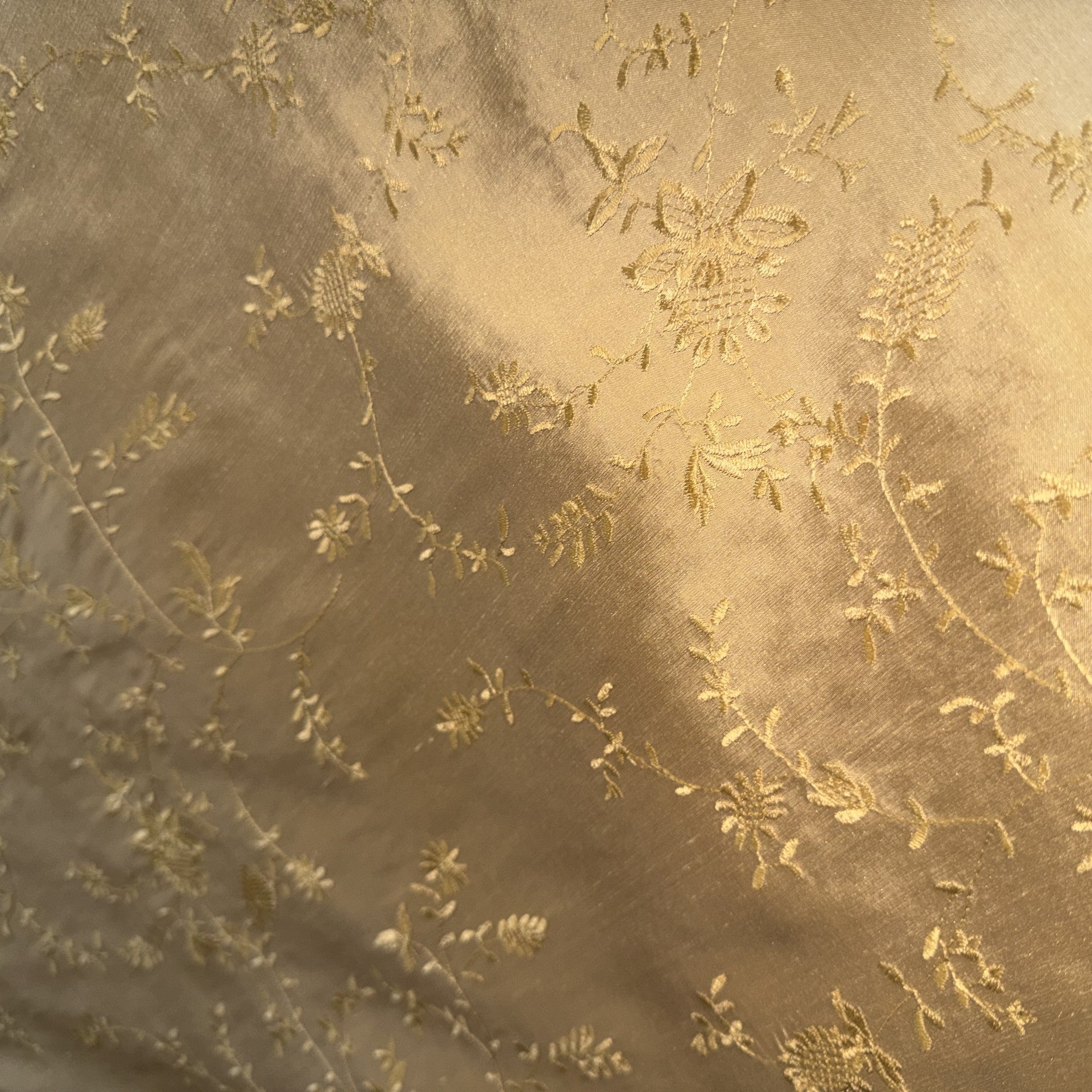 Cornelia Fabric in color Brass is a Floral Embroidered Silk Fabric that is good for Drapery & Curtain Fabric