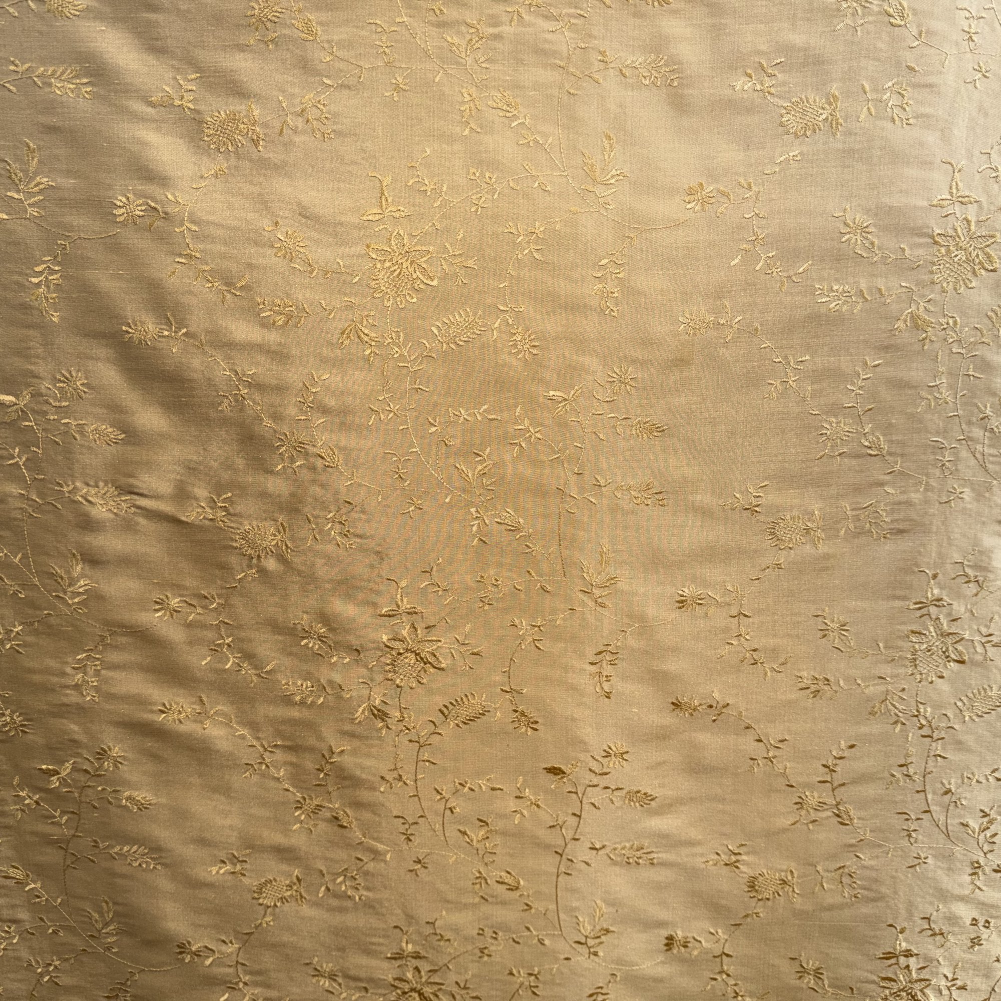 Cornelia Fabric in color Brass is a Floral Embroidered Silk Fabric that is good for Drapery & Curtain Fabric
