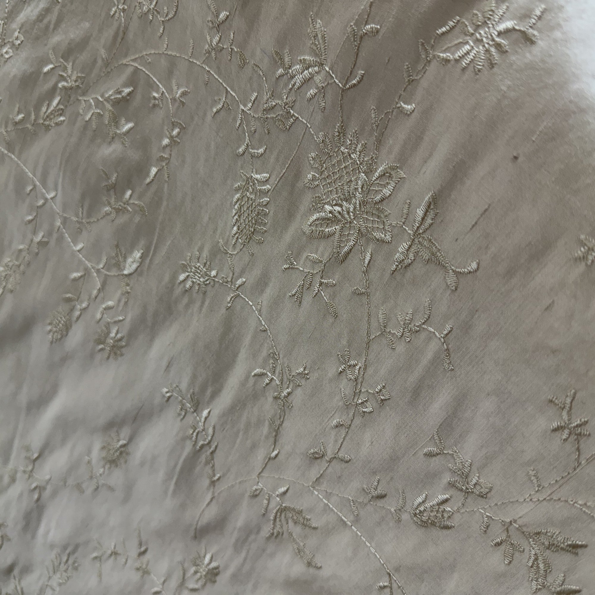 Cornelia Fabric in color Sand is a Floral Embroidered Silk Fabric that is good for Drapery & Curtain Fabric