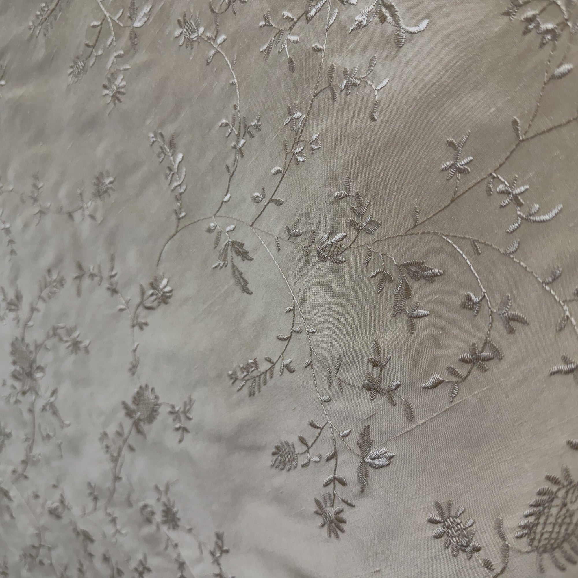Cornelia Fabric in color Taupe is a Floral Embroidered Silk Fabric that is good for Drapery & Curtain Fabric