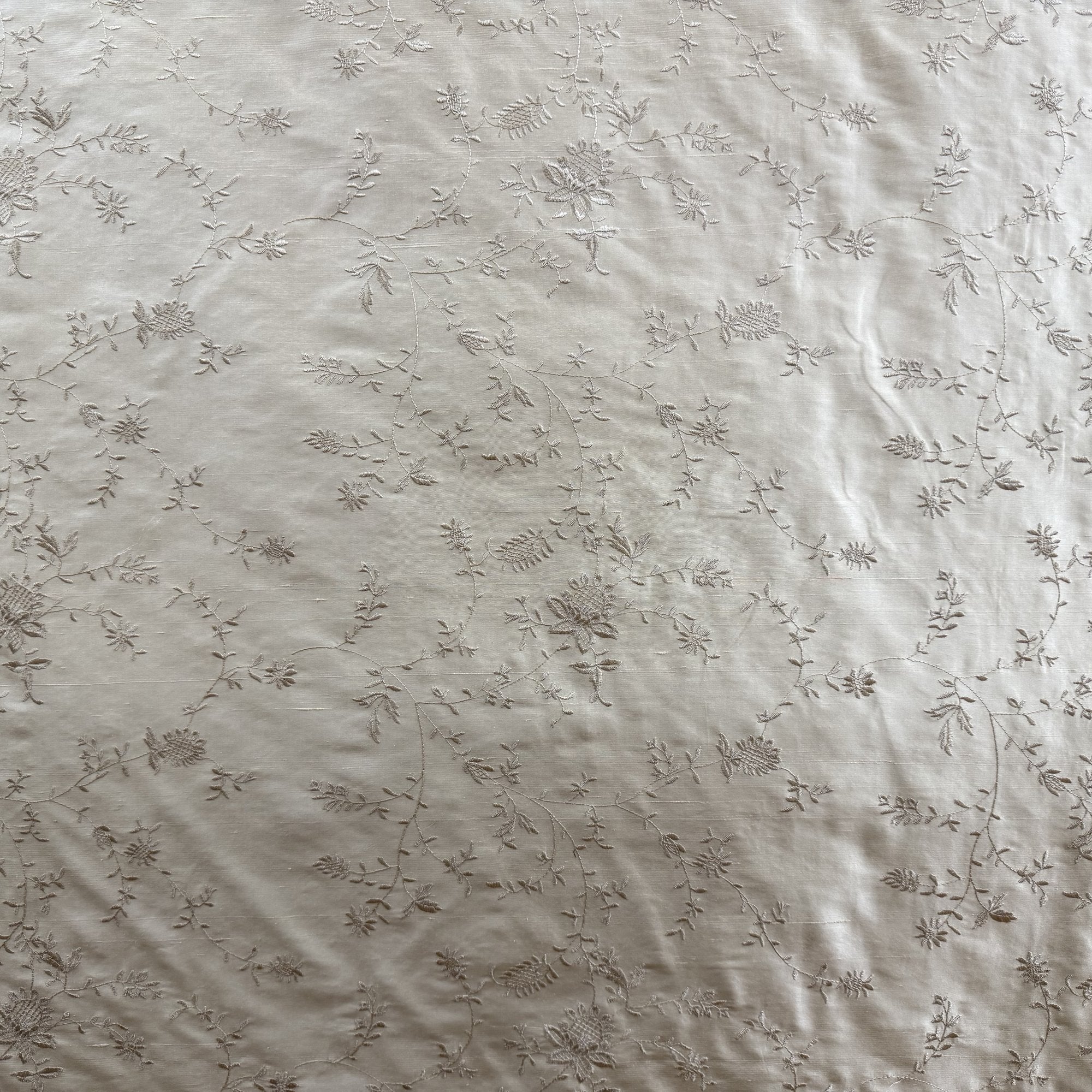 Cornelia Fabric in color Taupe is a Floral Embroidered Silk Fabric that is good for Drapery & Curtain Fabric
