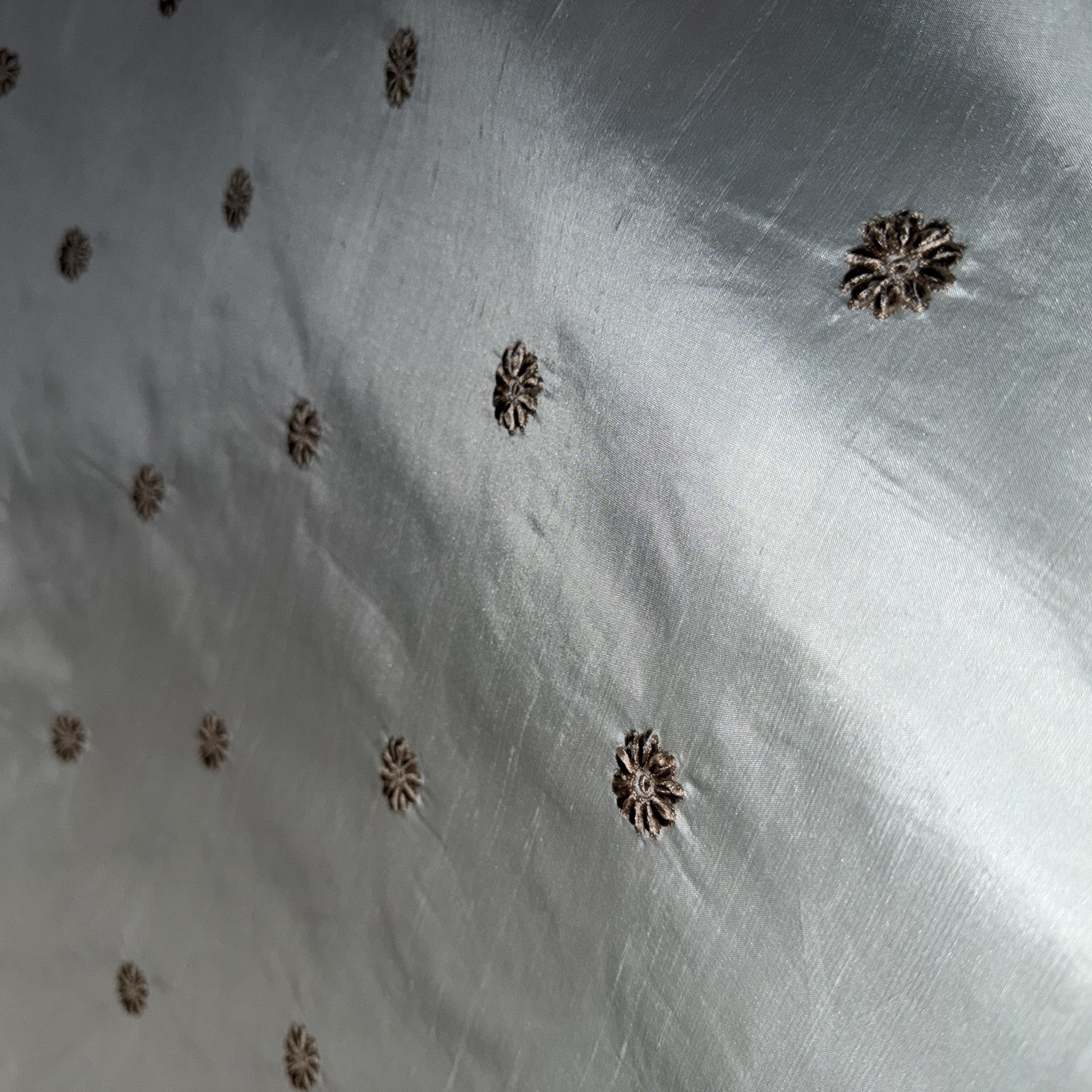 Dakota Fabric in color Bluebell is a Floral Dotted Embroidered Silk Fabric that is good for Drapery & Curtain Fabric