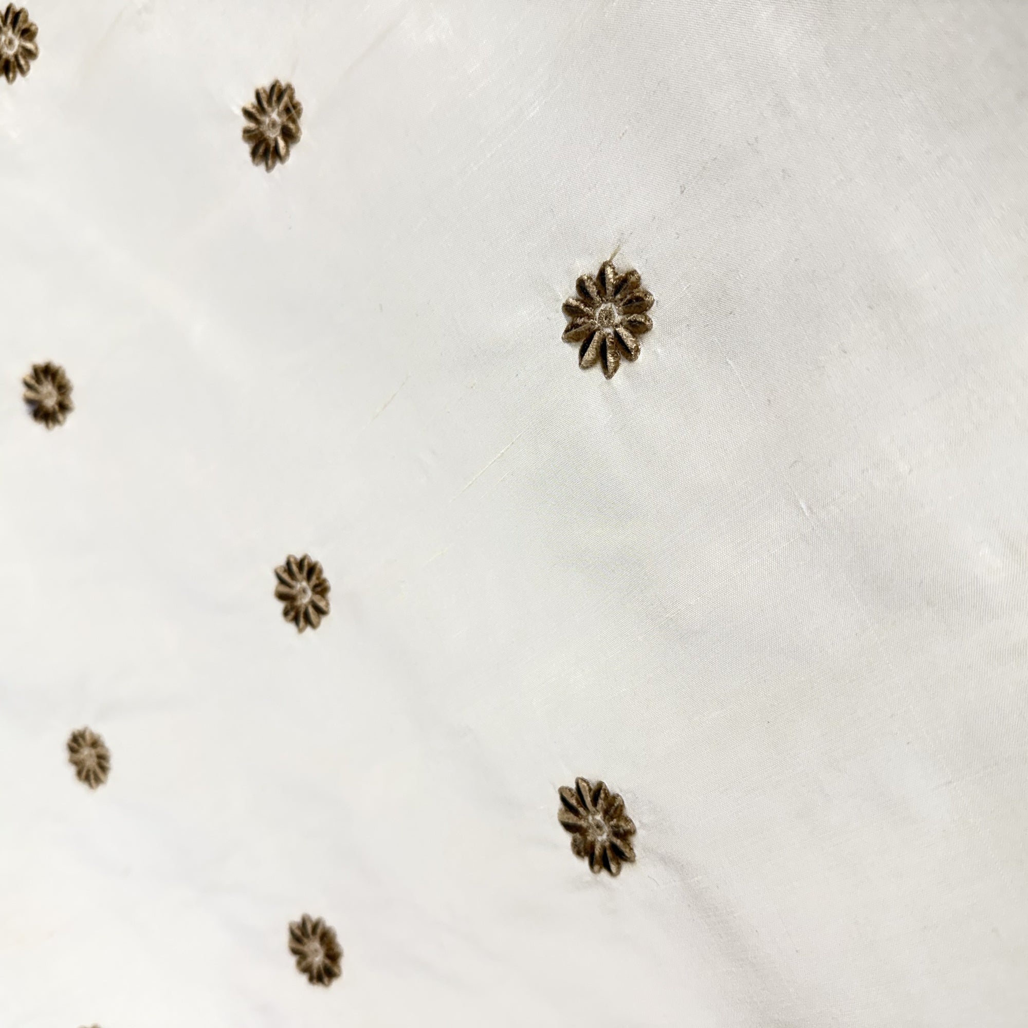 Dakota Fabric in color Butter is a Floral Dotted Embroidered Silk Fabric that is good for Drapery & Curtain Fabric