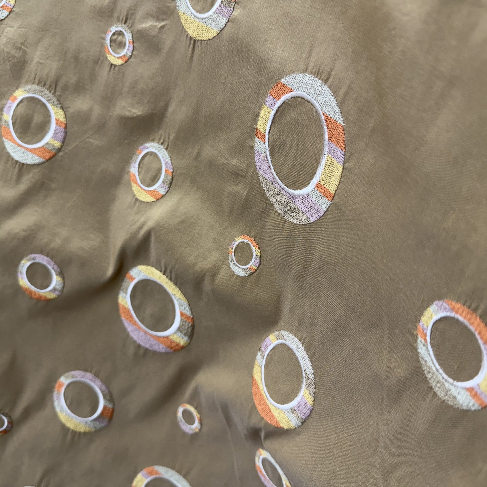 Disco Fabric in color Caramel is a Multi-Colored Circle Silk Fabric that is good for Drapery & Curtain Fabric