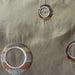 Disco Fabric in color Caramel is a Multi-Colored Circle Silk Fabric that is good for Drapery & Curtain Fabric