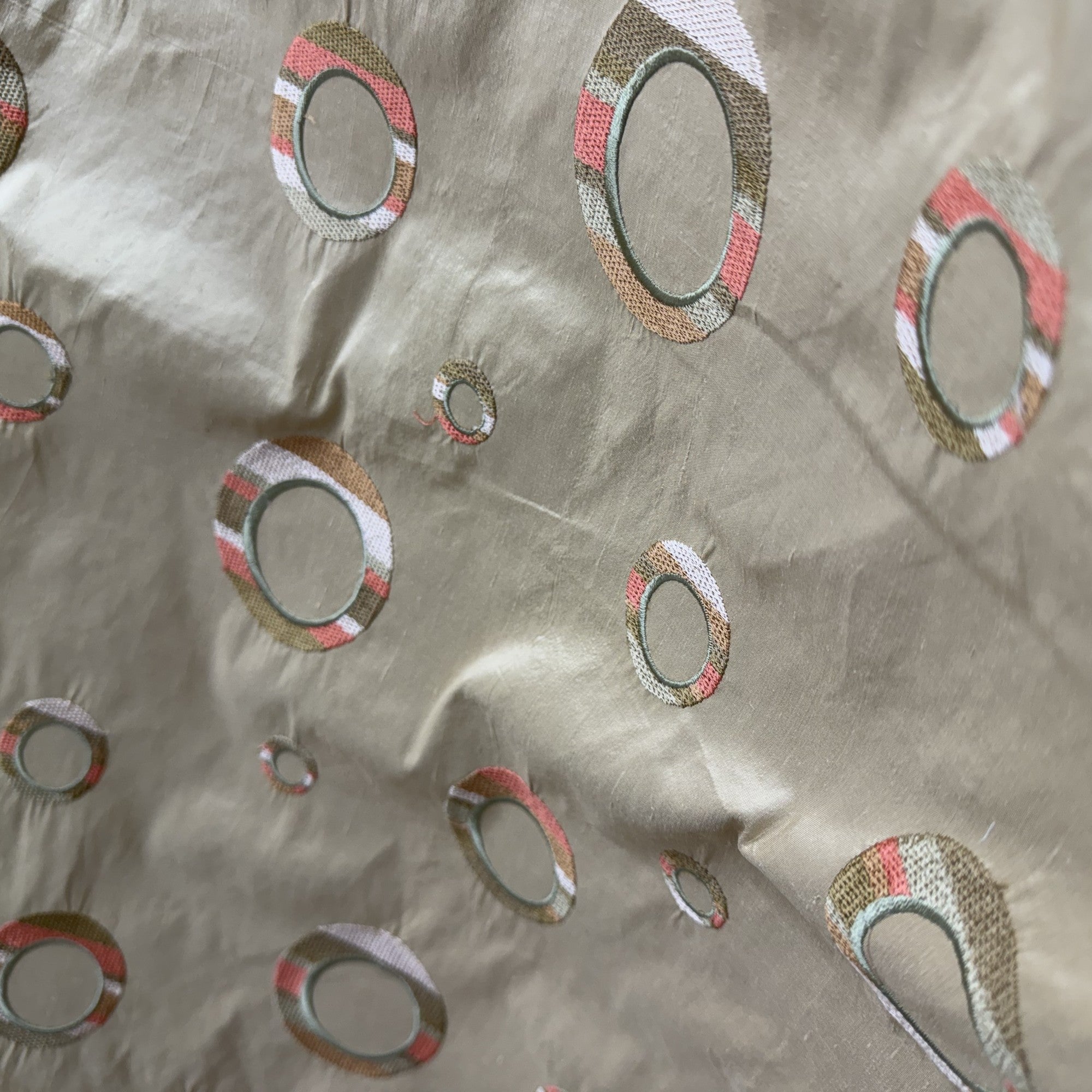 Disco Fabric in color Coral is a Multi-Colored Circle Silk Fabric that is good for Drapery & Curtain Fabric