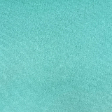 Giada fabric in color Spa showcasing fabric outdoor solid velvet drapery & curtain fabric.