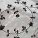 Kalei Fabric in color Putty is a Floral Swirl Velvet Embroidered Silk Fabric that is good for Drapery & Curtain Fabric