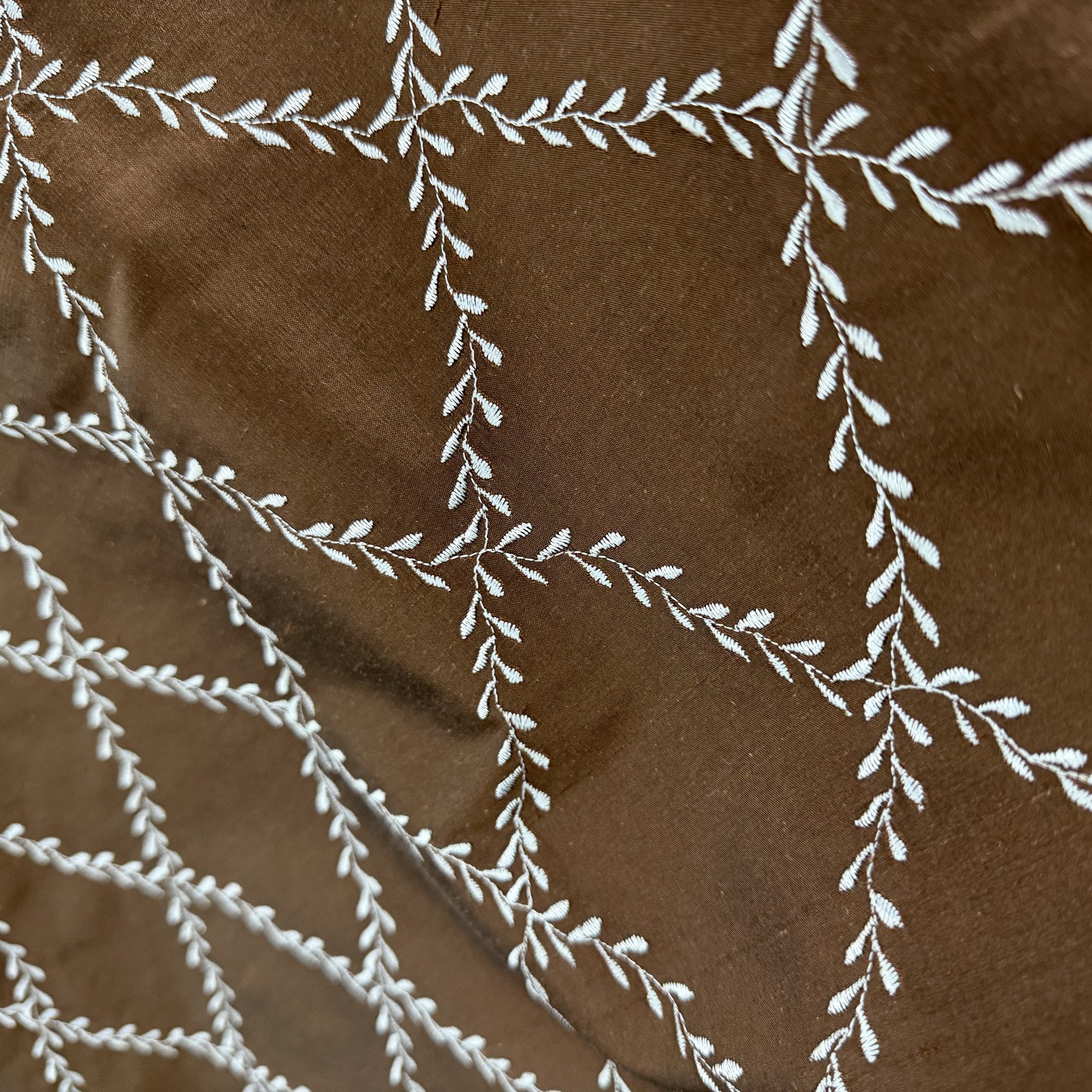 Marilyn Fabric in color Chocolate is a Diamond Embroidered Floral Silk Fabric that is good for Drapery & Curtain Fabric