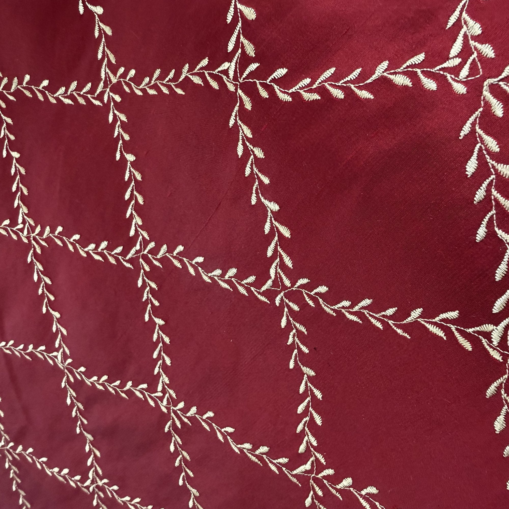 Marilyn Fabric in color Cranberry is a Diamond Embroidered Floral Silk Fabric that is good for Drapery & Curtain Fabric