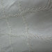 Marilyn Fabric in color Cream is a Diamond Embroidered Floral Silk Fabric that is good for Drapery & Curtain Fabric