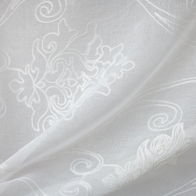 Bali Fabric in color White that has a wavy look is an Embroidered Damask Sheer Fabric that is good for Drapery & Curtain Fabric