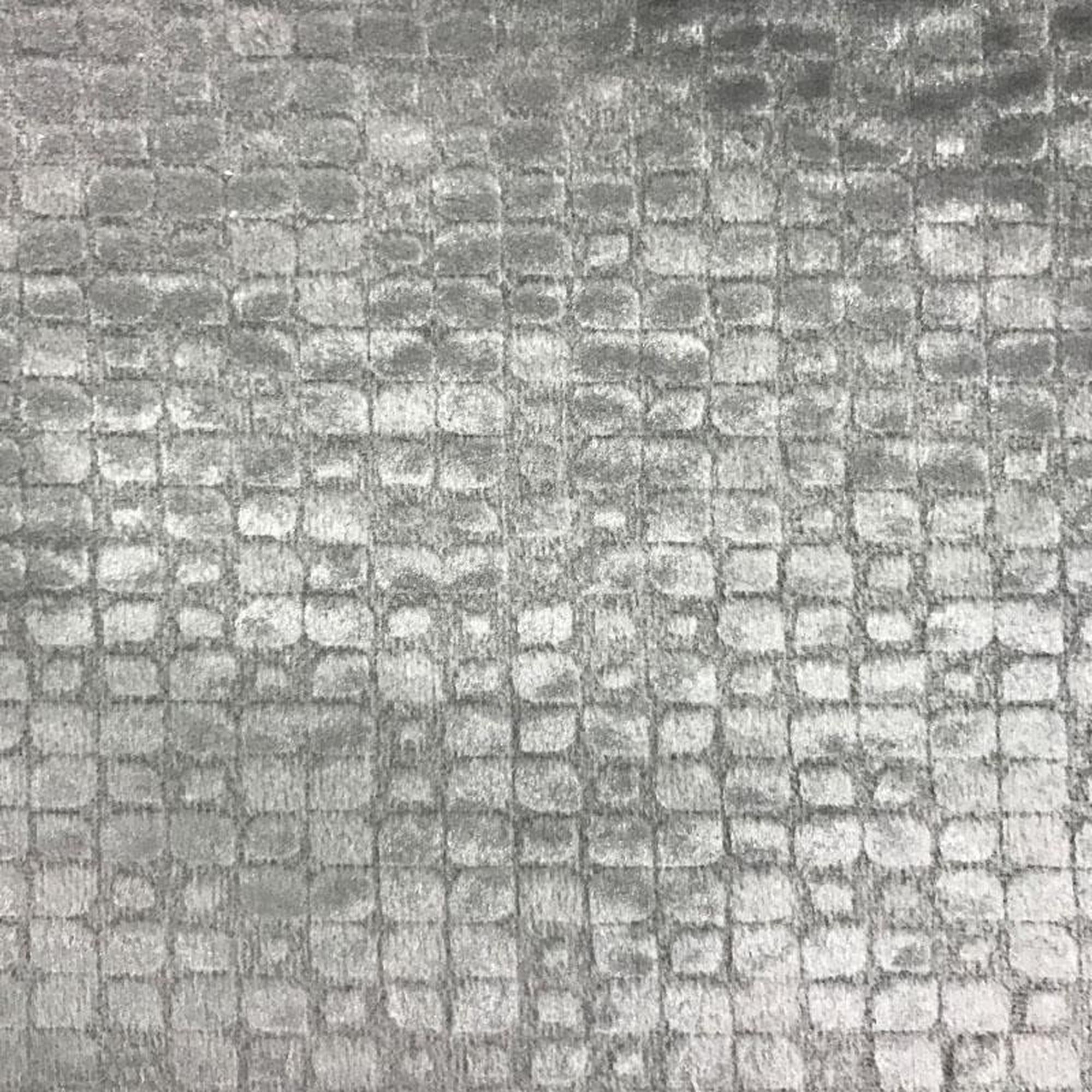 Baxter fabric in color Flax showcasing fabric embossed nrick-like velvet upholstery fabric.