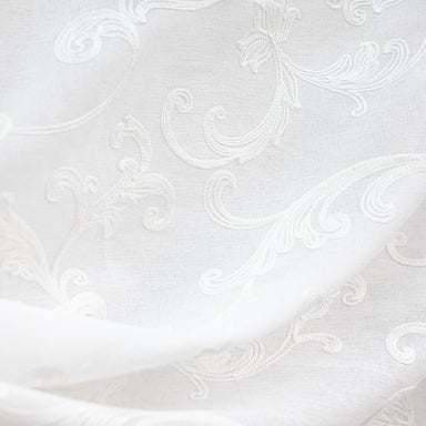 Lana Fabric in color White is an Embroidered Floral Sheer Fabric that is good for Drapery & Curtain Fabric