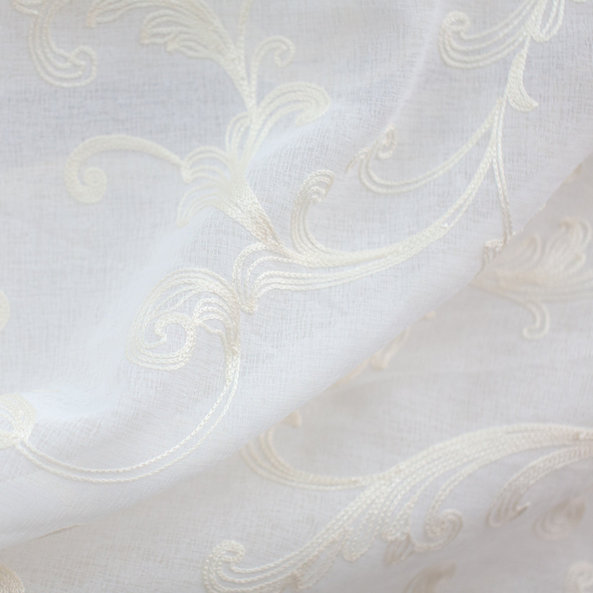 Bali fabric in color Ivory showcasing fabric embroidered damask sheer.
