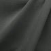 Linati fabric in color Charcoal showcasing fabric solid linen look upholstery fabric & drapery & curtain fabric & table linen fabric.