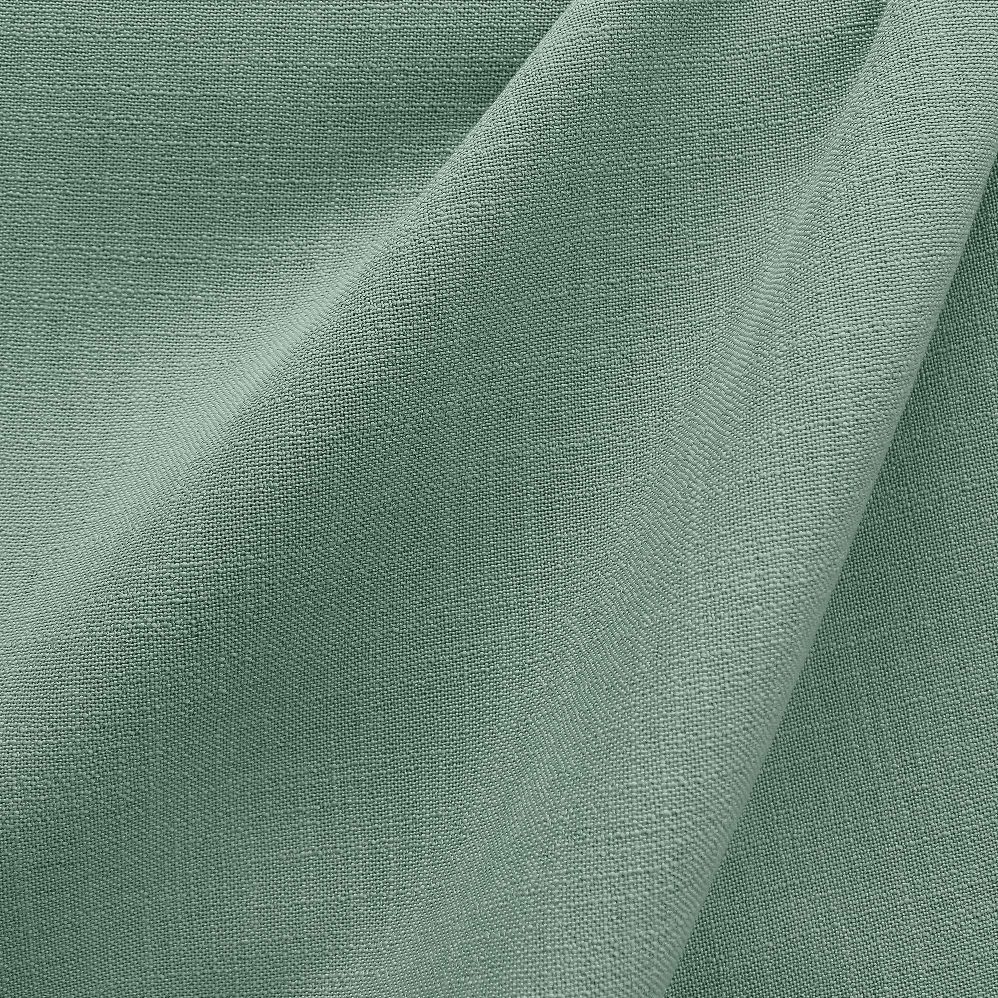 Linati fabric in color Seafoam showcasing fabric solid linen look upholstery fabric & drapery & curtain fabric & table linen fabric.