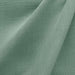 Linati fabric in color Seafoam showcasing fabric solid linen look upholstery fabric & drapery & curtain fabric & table linen fabric.