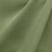 Linati fabric in color Basil showcasing fabric solid linen look upholstery fabric & drapery & curtain fabric & table linen fabric.