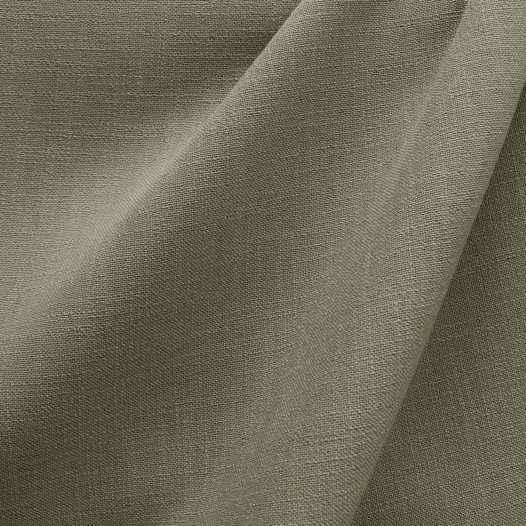 Linati fabric in color Bayleaf showcasing fabric solid linen look upholstery fabric & drapery & curtain fabric & table linen fabric.
