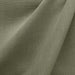 Linati fabric in color Bayleaf showcasing fabric solid linen look upholstery fabric & drapery & curtain fabric & table linen fabric.