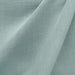 Linati fabric in color Seamist showcasing fabric solid linen look upholstery fabric & drapery & curtain fabric & table linen fabric.