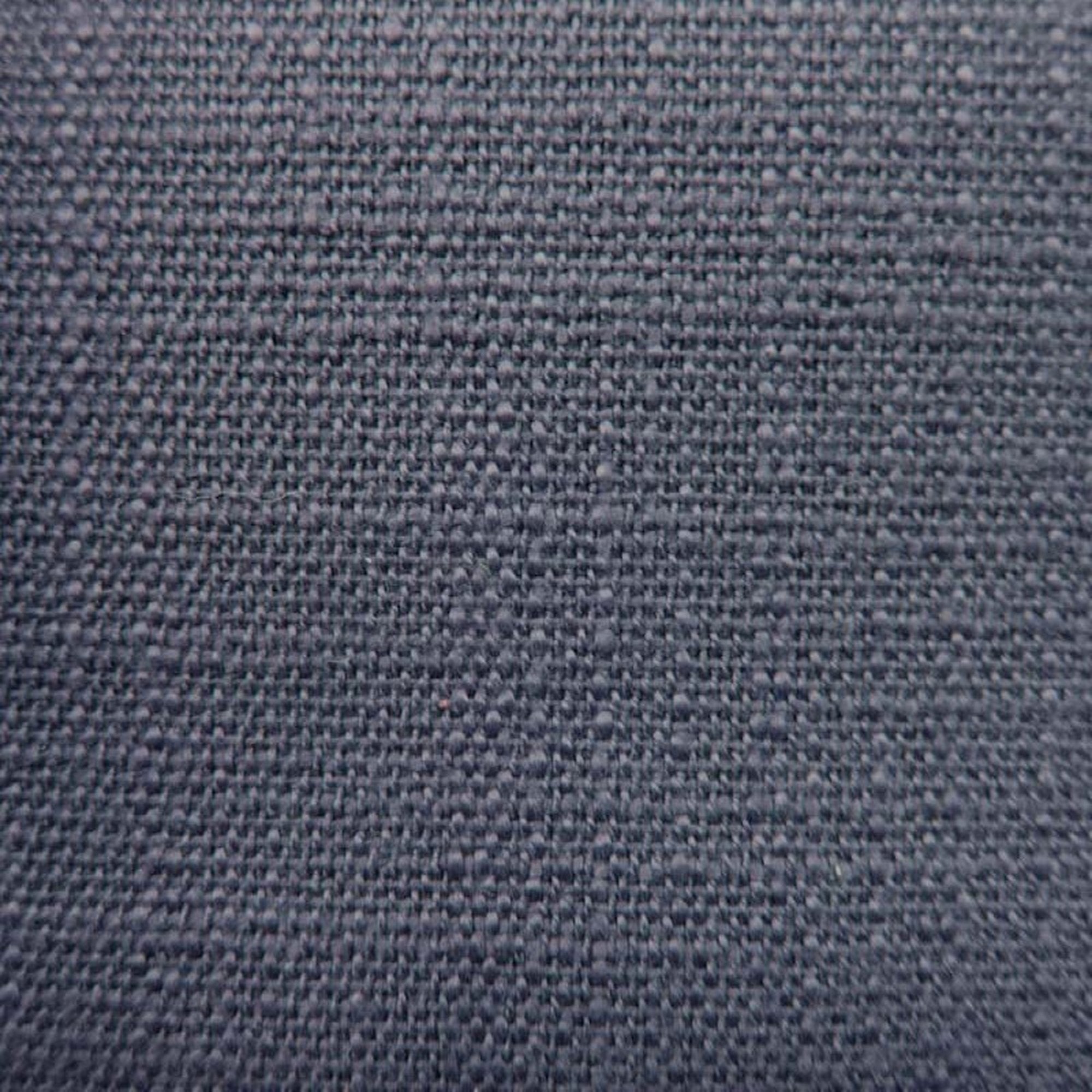 Malpensa fabric in color Charcoal showcasing fabric solid textured linen look upholstery fabric.