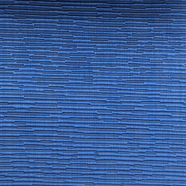 Plateau fabric in color Sapphire showcasing fabric solid textured matelasse embossed upholstery fabric & drapery & curtain fabric.